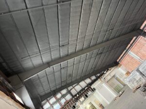 A long shot of the proofing insulation on the ceiling