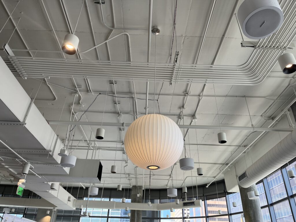 A picture of hanging lights on the roof