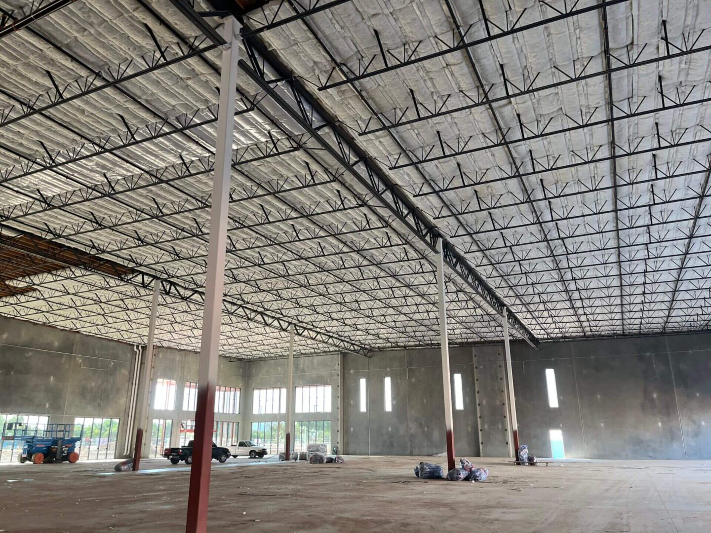 A picture of the walls and windows under construction